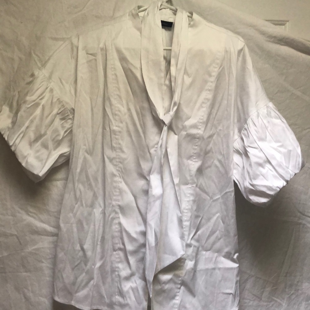 Great white button down with neck tie.